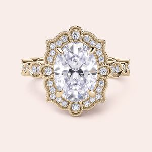 Detailed top view of oval halo vintage-inspired diamond ring set with exquisite filigree in recycled rose gold 