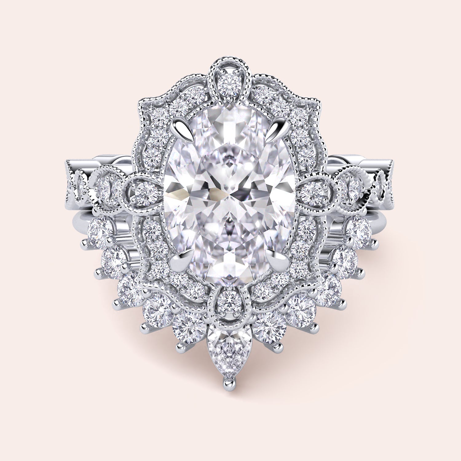 Front detailed view of oval halo diamond ring set featuring intricate vintage filigree and accent diamonds in recycled white gold | #14KRecycledWhiteGold #18KRecycledWhiteGold #Platinum