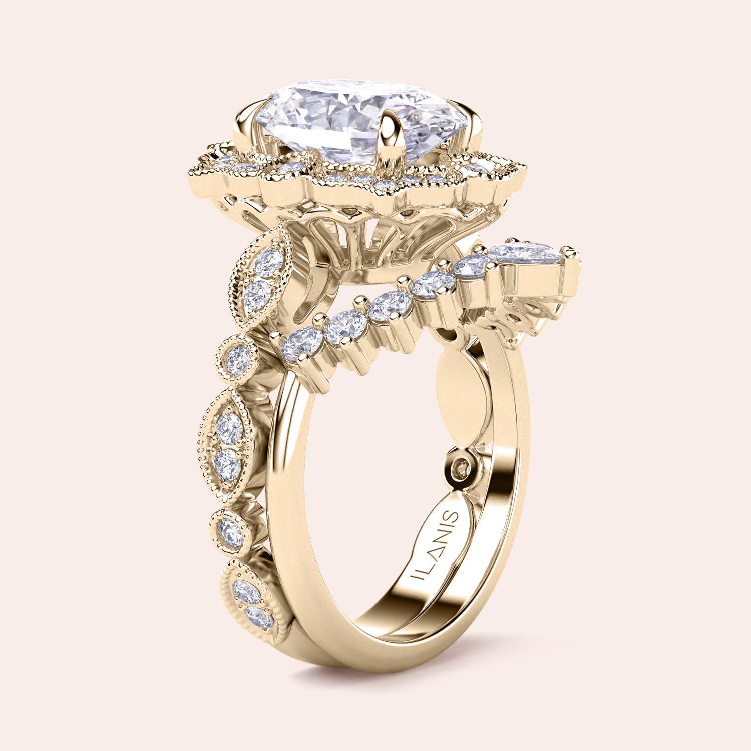 Angled side view of stunning oval halo diamond bridal set with vintage filigree design in recycled yellow gold | 
#14KRecycledYellowGold #18KRecycledYellowGold