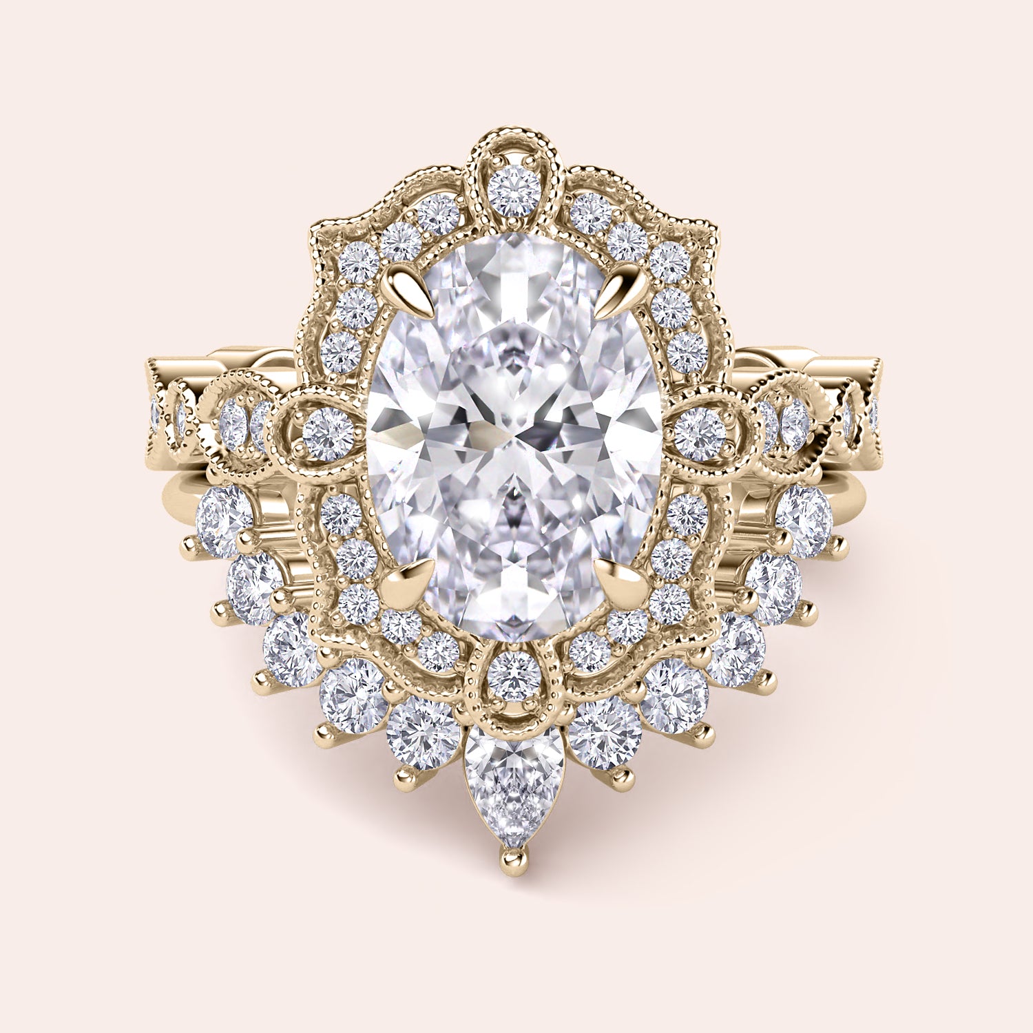 Front detailed view of oval halo diamond ring set featuring intricate vintage filigree and accent diamonds in recycled yellow gold 
