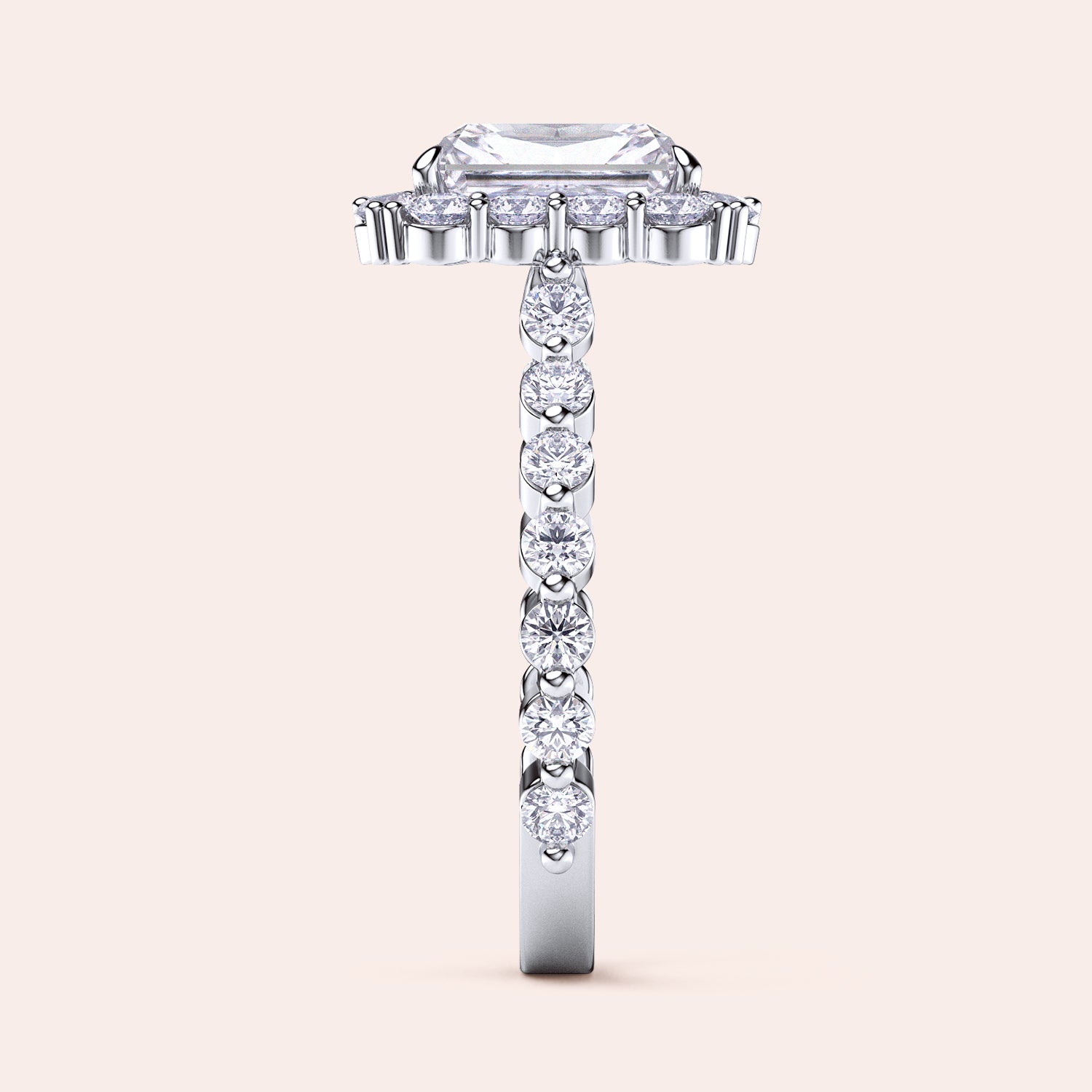 Side view of radiant-cut diamond halo engagement ring showcasing sparkling diamond band in white gold or platinum | #14KRecycledWhiteGold #18KRecycledWhiteGold #Platinum