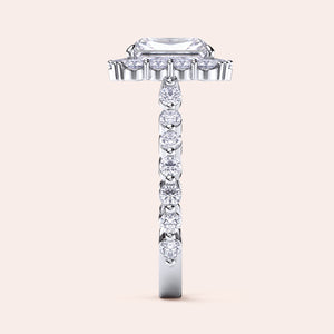 Side view of radiant-cut diamond halo engagement ring showcasing sparkling diamond band in white gold or platinum 