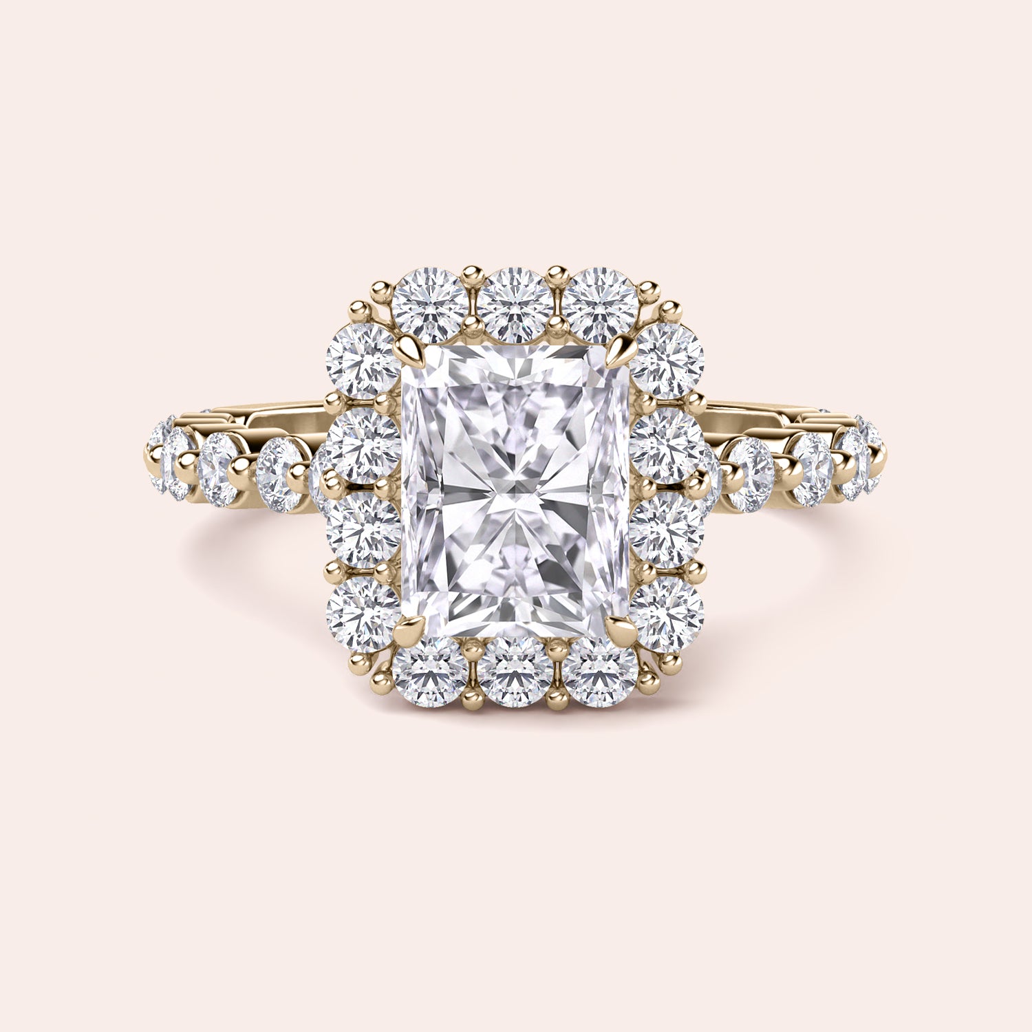 Front view of radiant-cut diamond halo engagement ring surrounded by brilliant diamonds in yellow gold setting | #14KRecycledYellowGold #18KRecycledYellowGold