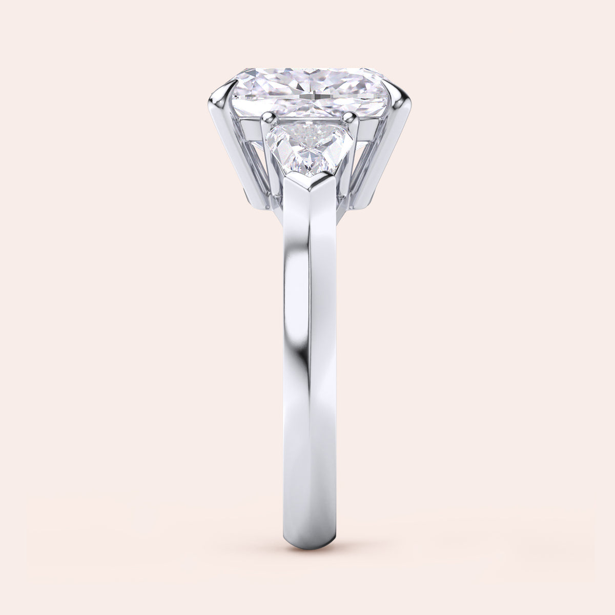 Stunning 14K/18K white gold trilogy engagement ring cushion cut center diamond, and shield side stones. 