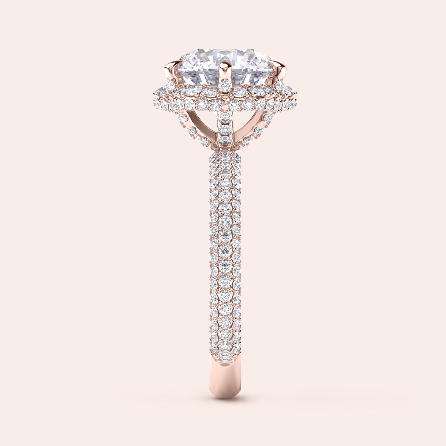 Side profile of a rose gold cushion-cut diamond engagement ring, highlighting intricate design elements and a diamond-studded band that exudes sophistication. | #14KRecycledRoseGold #18KRecycledRoseGold
