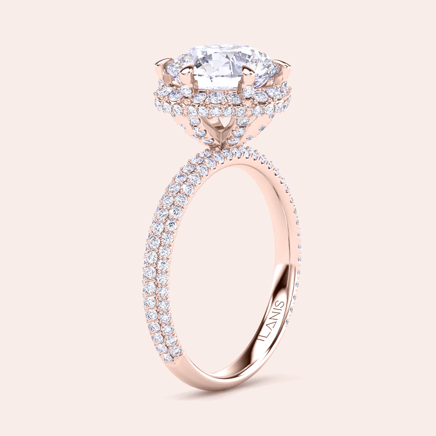 Exquisite rose gold engagement ring featuring a halo of pavé-set diamonds around a radiant cushion-cut center stone, mounted on a fully diamond-encrusted band. | #14KRecycledRoseGold #18KRecycledRoseGold