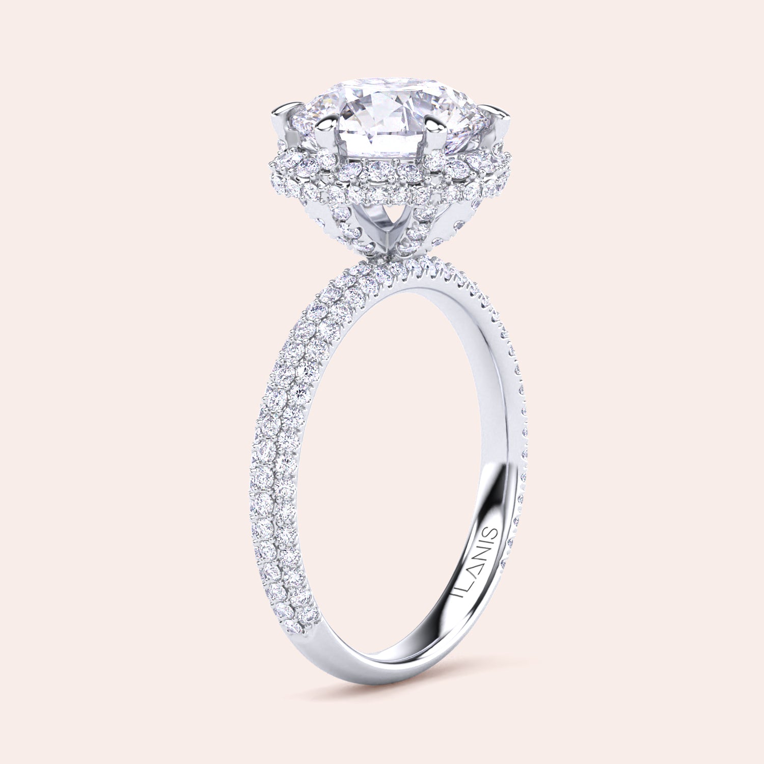 Exquisite white gold engagement ring featuring a halo of pavé-set diamonds around a radiant cushion-cut center stone, mounted on a fully diamond-encrusted band. | #14KRecycledWhiteGold #18KRecycledWhiteGold #Platinum