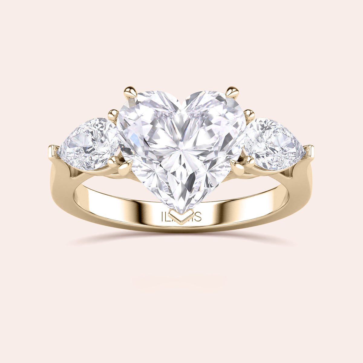 Yellow gold engagement ring with a heart-shaped main diamond and elegant teardrop diamonds, designed for a luxurious and timeless proposal. 