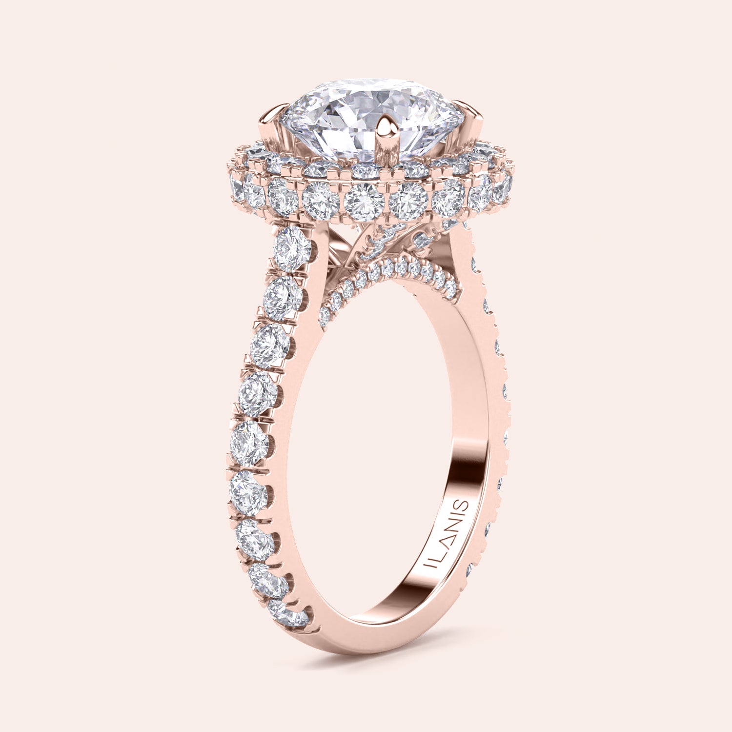 Elegant rose gold engagement ring with a brilliant round-cut diamond center, encircled by a dazzling halo of smaller diamonds, adding opulence and sparkle. | #14KRecycledRoseGold #18KRecycledRoseGold