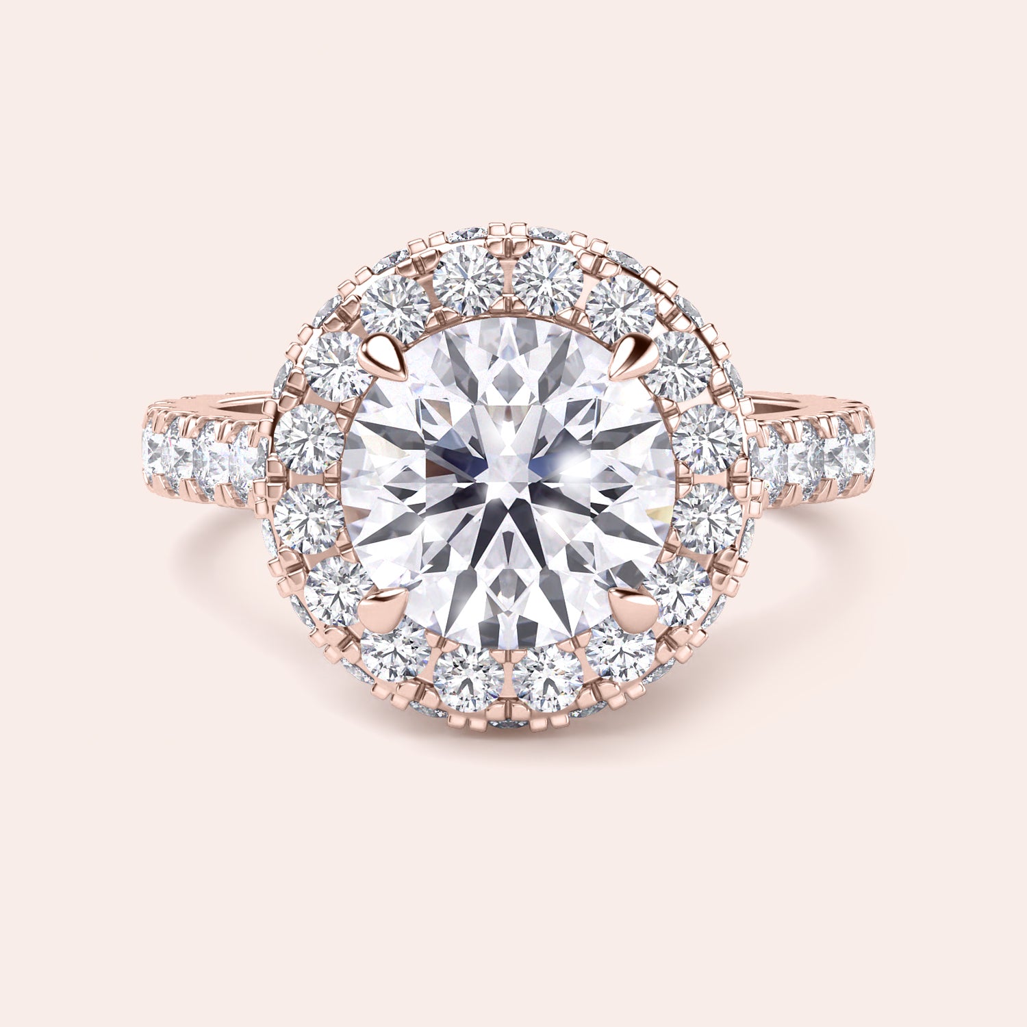 Top view of a rose gold engagement ring featuring a round-cut diamond with a halo, elegantly designed to catch the light and mesmerize. | #14KRecycledRoseGold #18KRecycledRoseGold