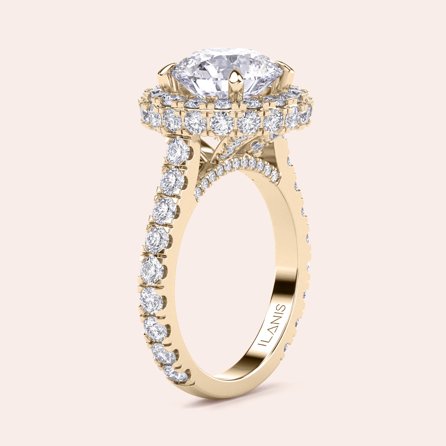 Elegant yellow gold engagement ring with a brilliant round-cut diamond center, encircled by a dazzling halo of smaller diamonds, adding opulence and sparkle. | #14KRecycledYellowGold #18KRecycledYellowGold