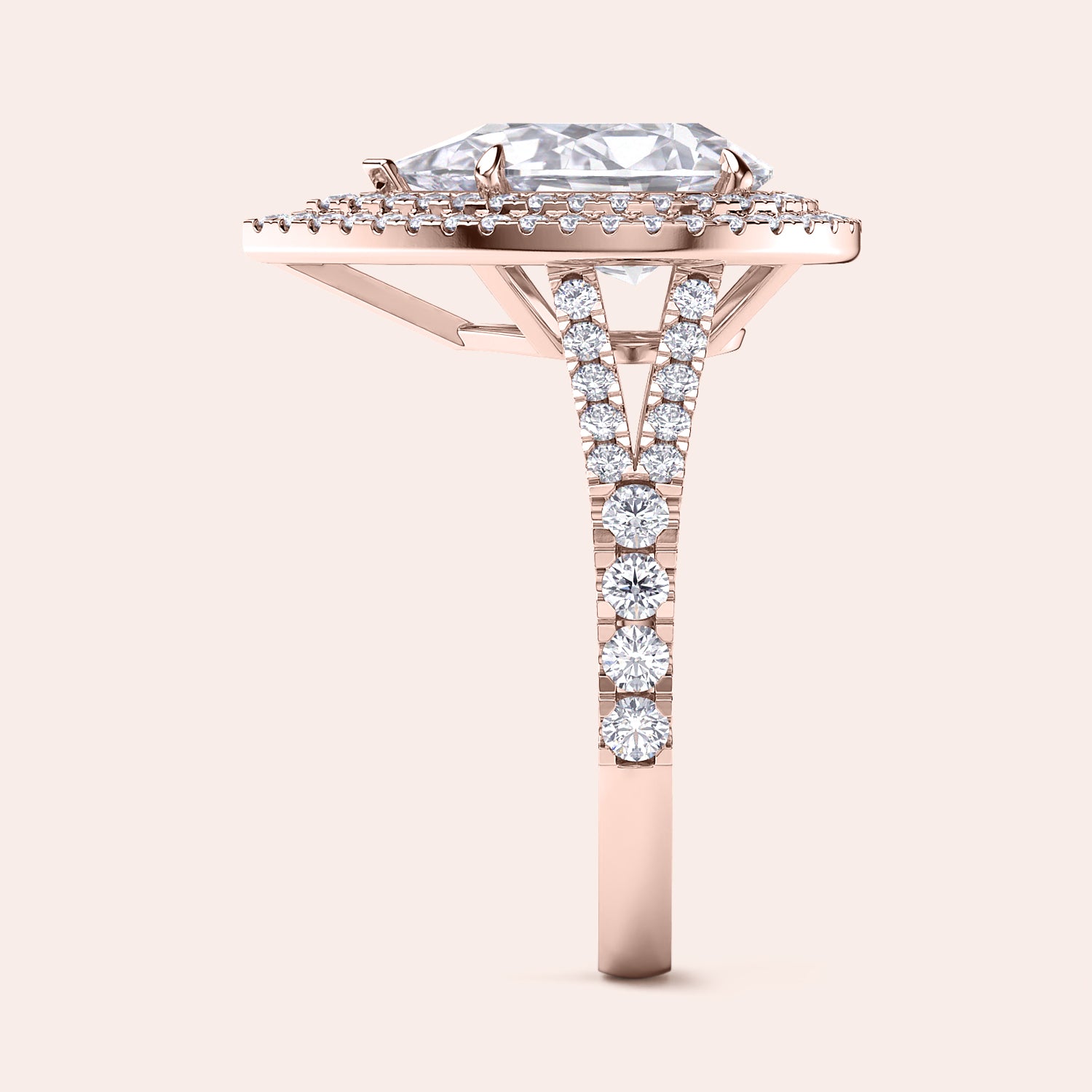 Elegant rose gold engagement ring featuring a cushion-cut center stone surrounded by a double halo of micro-pavé diamonds, showcasing intricate side detail. #14KRecycledRoseGold #18KRecycledRoseGold