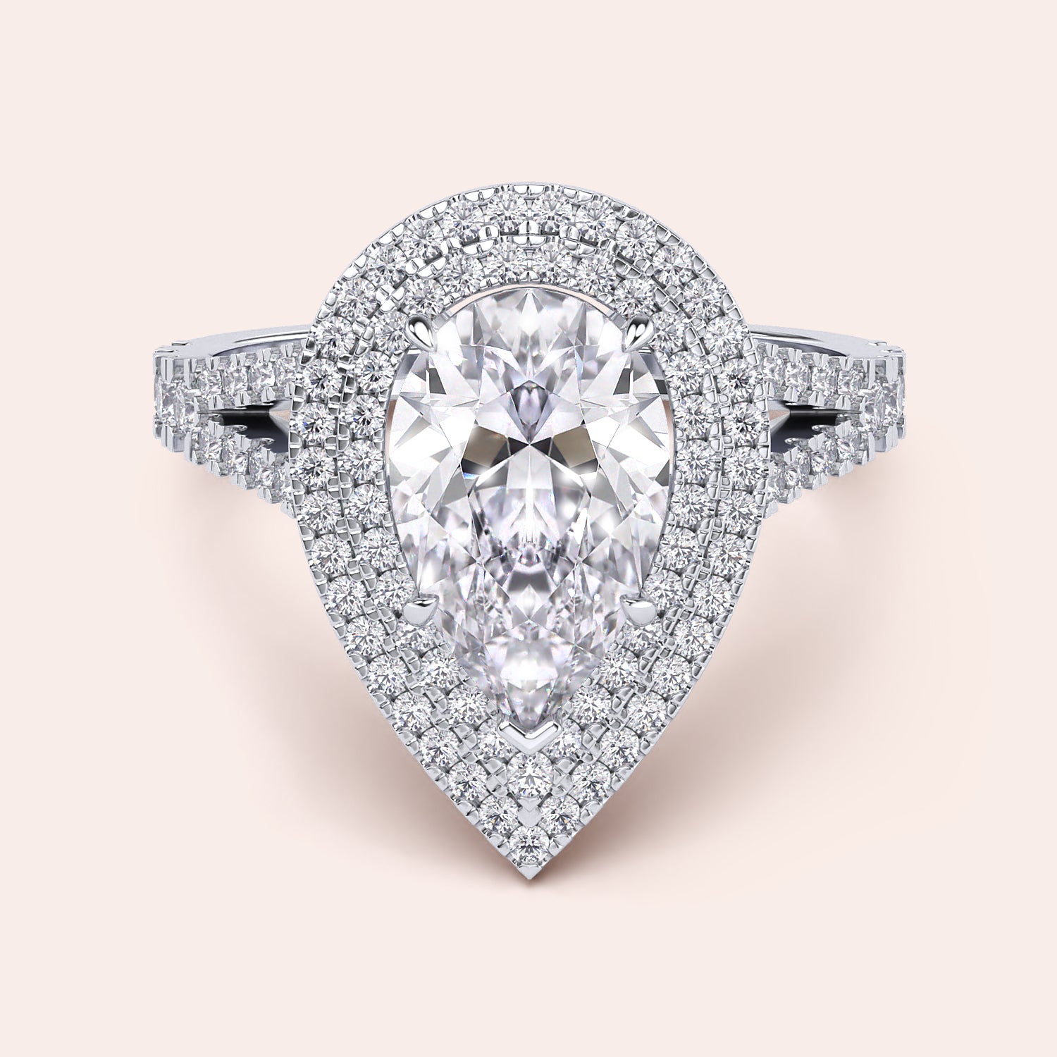 Chic white gold engagement ring displaying a radiant cushion-cut diamond at the center, accented by a delicate pavé setting along the split shank for a glamorous effect. #14KRecycledWhiteGold #18KRecycledWhiteGold #Platinum