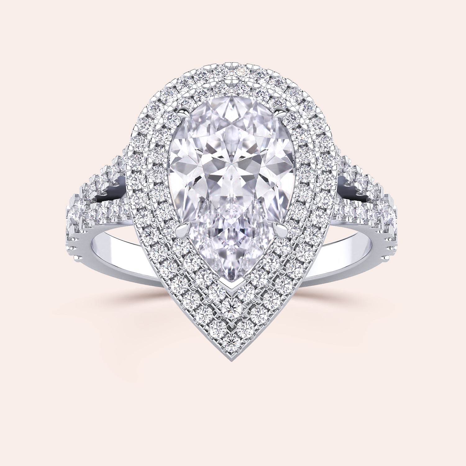 Captivating white gold engagement ring with a heart-shaped diamond, beautifully complemented by a double halo of sparkling diamonds and a split shank design that radiates elegance. #14KRecycledWhiteGold #18KRecycledWhiteGold #Platinum