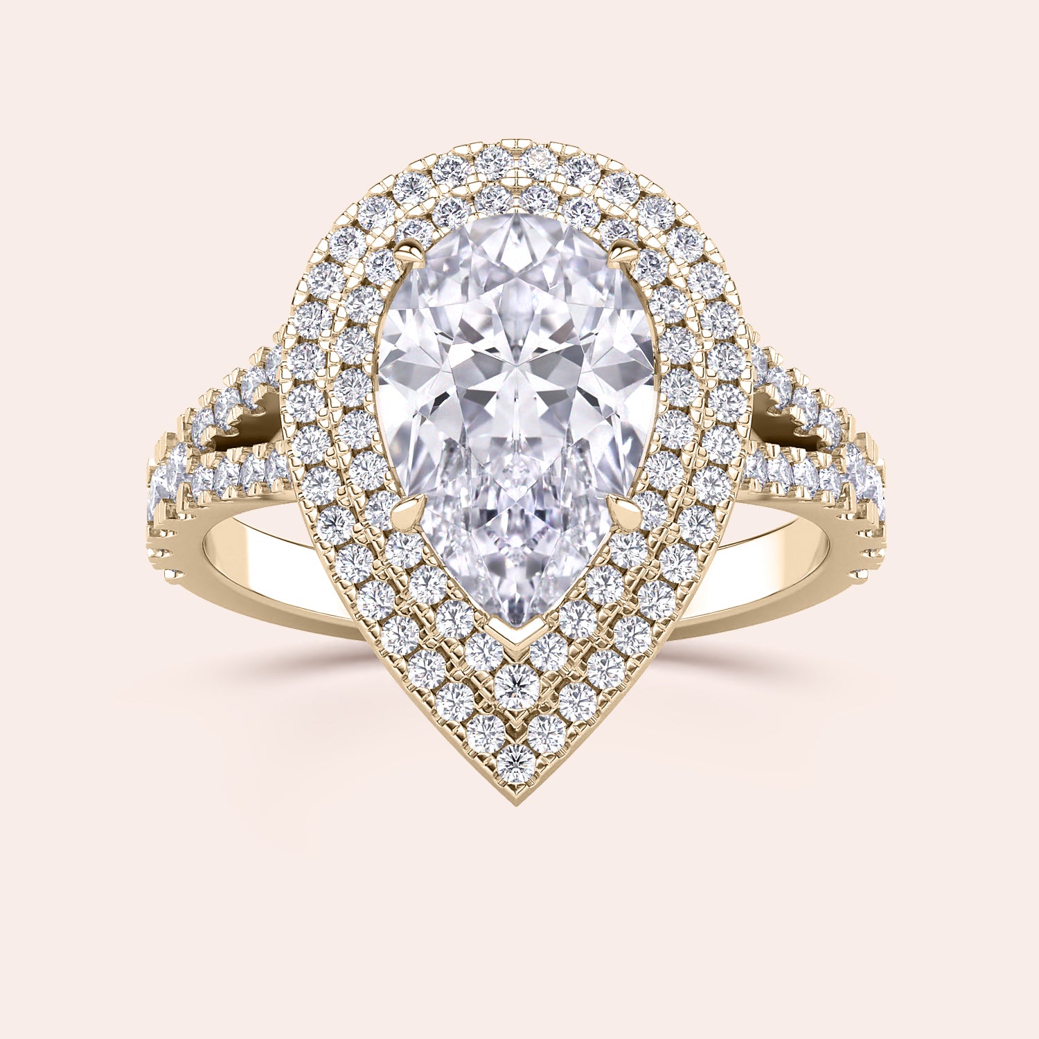 Captivating yellow gold engagement ring with a heart-shaped diamond, beautifully complemented by a double halo of sparkling diamonds and a split shank design that radiates elegance. #14KRecycledYellowGold #18KRecycledYellowGold