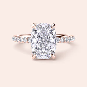 14K Rose Gold Cushion-Cut Diamond Engagement Ring with Pave Band, showcasing a stunning large diamond center stone worn on model.