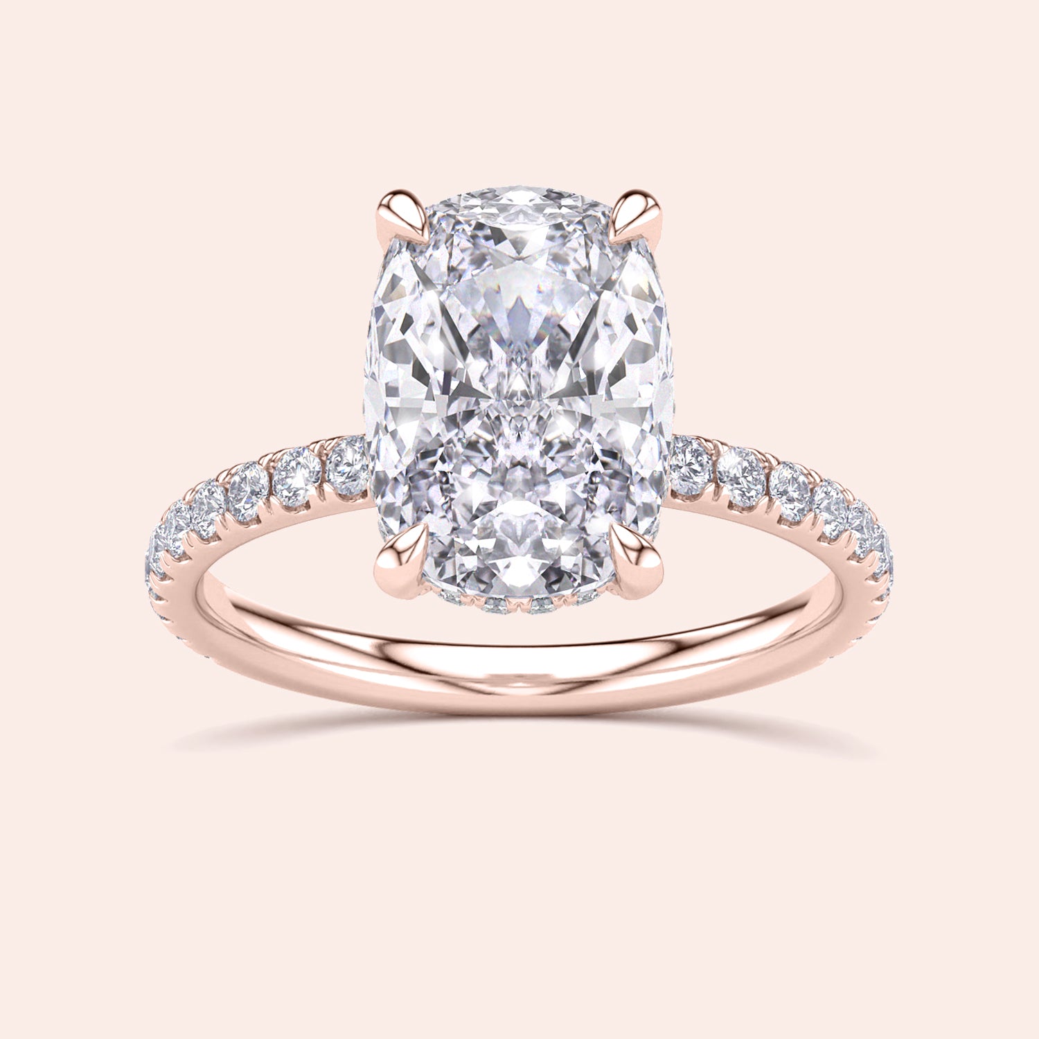 Stunning cushion-cut diamond engagement ring in rose gold with pave band, available in 14K, 18K, or platinum.|







#14KRecycledRoseGold
#18KRecycledRoseGold


