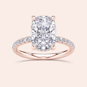 Stunning cushion-cut diamond engagement ring in rose gold with pave band, available in 14K, 18K, or platinum.