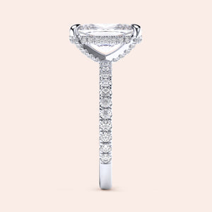 Elegant 14K white gold cushion pave engagement ring with a hidden halo and diamond-studded band, perfect for special moments.