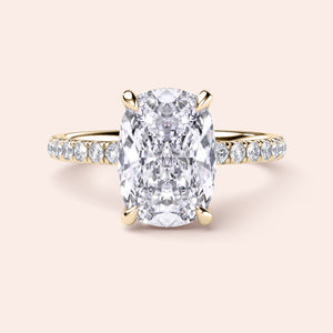 Elegant 14K/18K yellow gold engagement ring with a cushion-cut diamond and pave band, perfect for a timeless proposal.