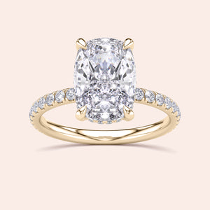 Elegant 14K yellow gold cushion-cut diamond engagement ring with a pave band, adorned with round brilliant diamonds.
