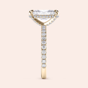 "Stunning Kiran cushion pave hidden halo engagement ring in 14K yellow gold, featuring exquisite round diamonds for a timeless look."