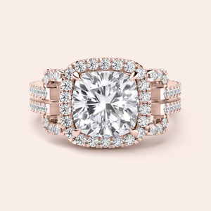 Elegant halo diamond engagement ring in 14K rose gold with cushion-cut center and sparkling accent diamonds. Not worn on model.