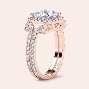 Elegant 14K rose gold halo engagement ring with marquise diamond andPave-set diamonds, showcasing intricate design.