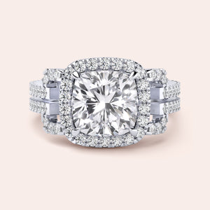 Elegant cushion cut diamond engagement ring with double halo and split shank design in 14K or 18K gold or platinum.