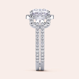 High-quality 14K white gold cushion halo split shank engagement ring with round-cut diamonds, showcasing intricate craftsmanship.