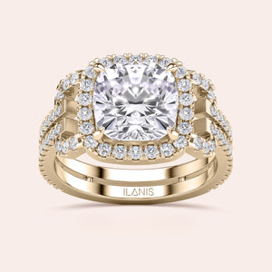 14K yellow gold cushion-cut diamond halo engagement ring with double band and intricate detailing, shown unworn.