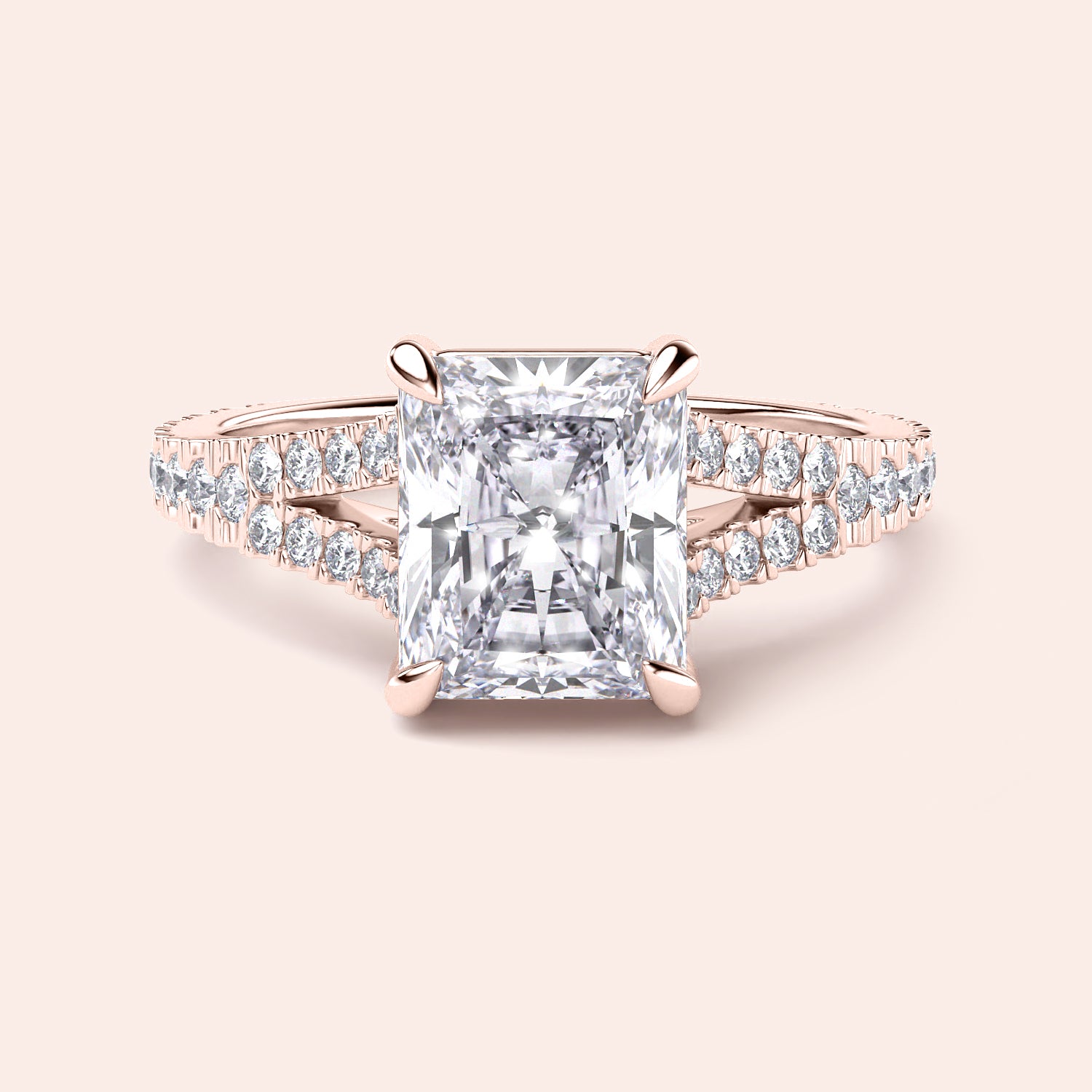 14K rose gold engagement ring with radiant cut diamond center, side diamonds, intricate design, displayed in close-up view.|







#14KRecycledRoseGold
#18KRecycledRoseGold


