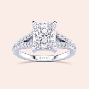 Radiant cut diamond engagement ring in 14K white gold, adorned with sparkling side stones. Perfect for your love story.