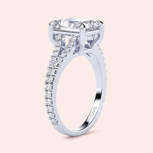 Elegant 14K white gold engagement ring with emerald-cut diamond and pave-set diamonds, perfect for a sophisticated proposal.