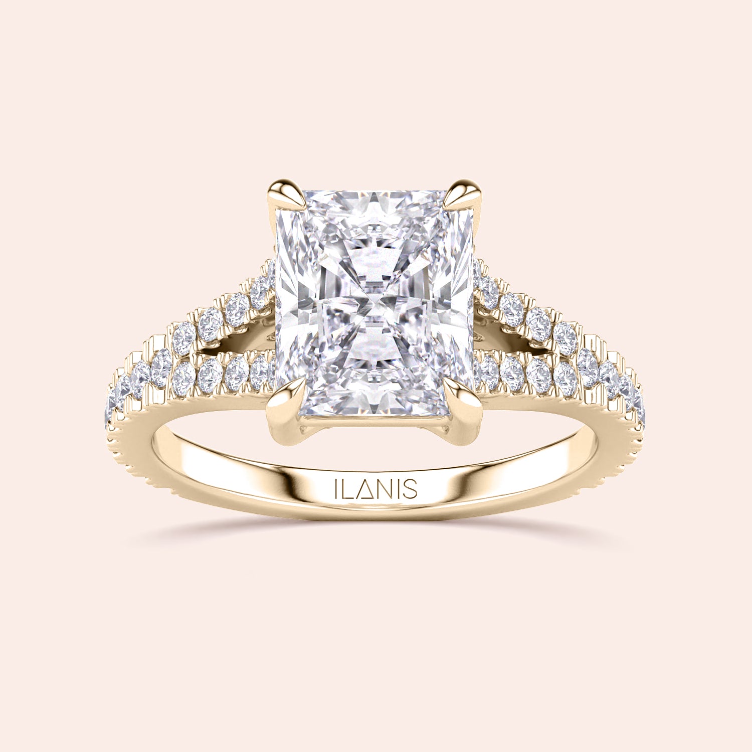 Elegant 14K gold engagement ring with radiant cut diamond and split shank design, showcasing timeless beauty by ILANIS.|




#14KRecycledYellowGold
#18KRecycledYellowGold





