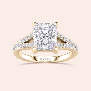Elegant 14K gold engagement ring with radiant cut diamond and split shank design, showcasing timeless beauty by ILANIS.