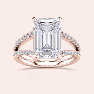 Emerald cut diamond engagement ring with split shank design in 14K Rose Gold, set with pave diamonds, elegant and stunning.