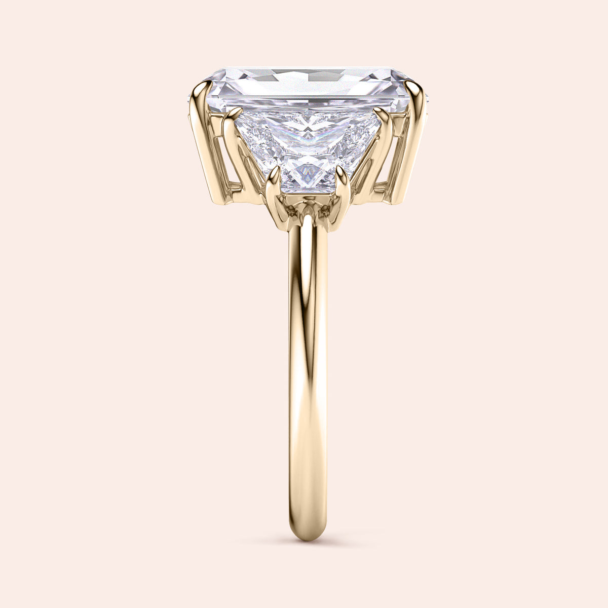 Elegant 14K gold engagement ring featuring a dazzling trapezoid diamond, showcasing timeless beauty and sophistication.