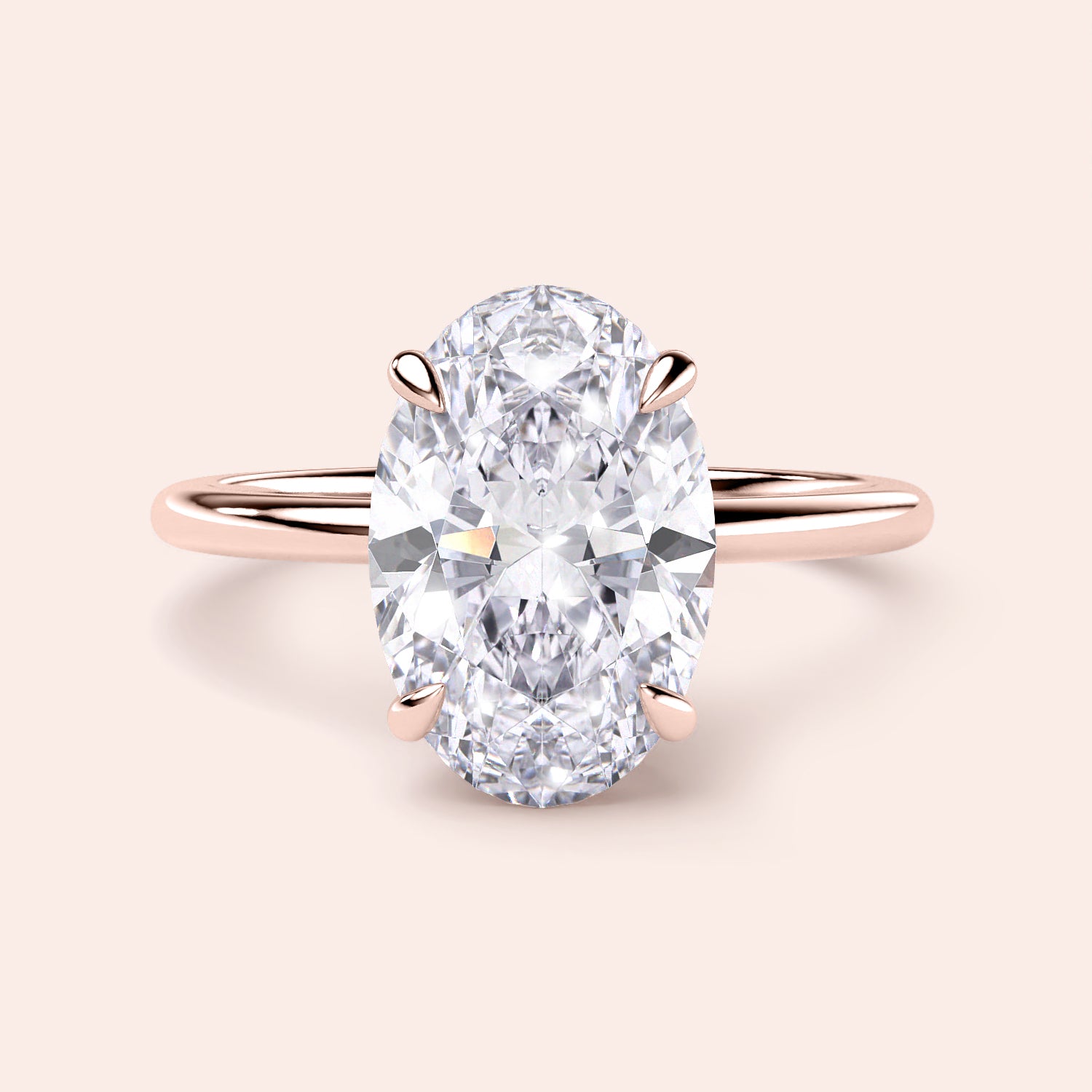Stunning 14K rose gold oval solitaire engagement ring with a hidden halo for a timeless, elegant look.|







#14KRecycledRoseGold
#18KRecycledRoseGold


