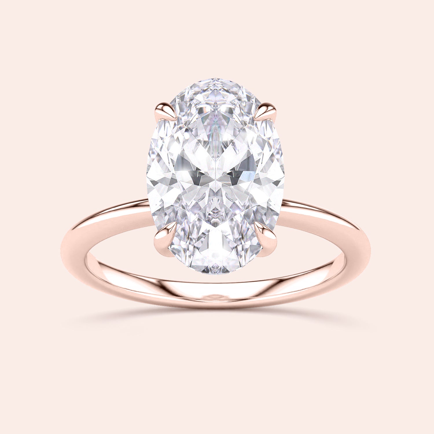 Elegant oval-shaped diamond engagement ring in a 14K rose gold band with hidden halo, perfect for a timeless love.|







#14KRecycledRoseGold
#18KRecycledRoseGold


