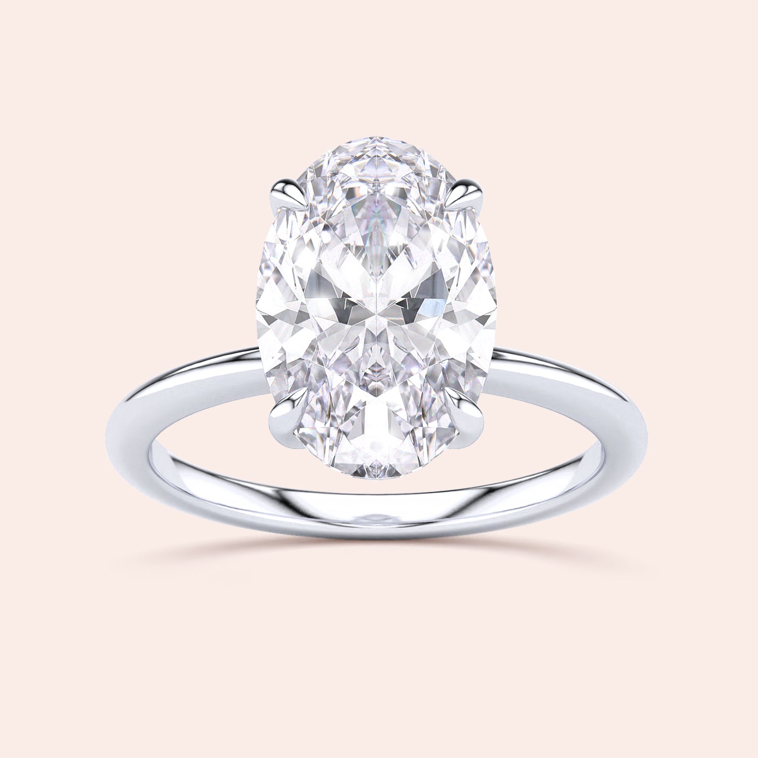 Elegant oval diamond engagement ring with a simple band, available in 14K, 18K gold, or platinum.|

#14KRecycledWhiteGold
#18KRecycledWhiteGold








#Platinum