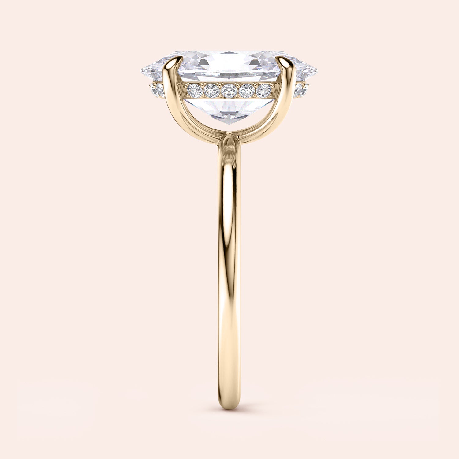 Marquise-cut diamond engagement ring in 14K yellow gold, featuring a delicate pave band on a neutral background.|




#14KRecycledYellowGold
#18KRecycledYellowGold





