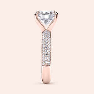 Elegant rose goldPave engagement ring featuring a heart-shaped diamond, with additional diamonds on the band for extra sparkle.