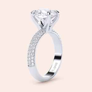 Elegant 14K, 18K, or platinum diamond solitaire engagement ring with round brilliant cut and pave band.