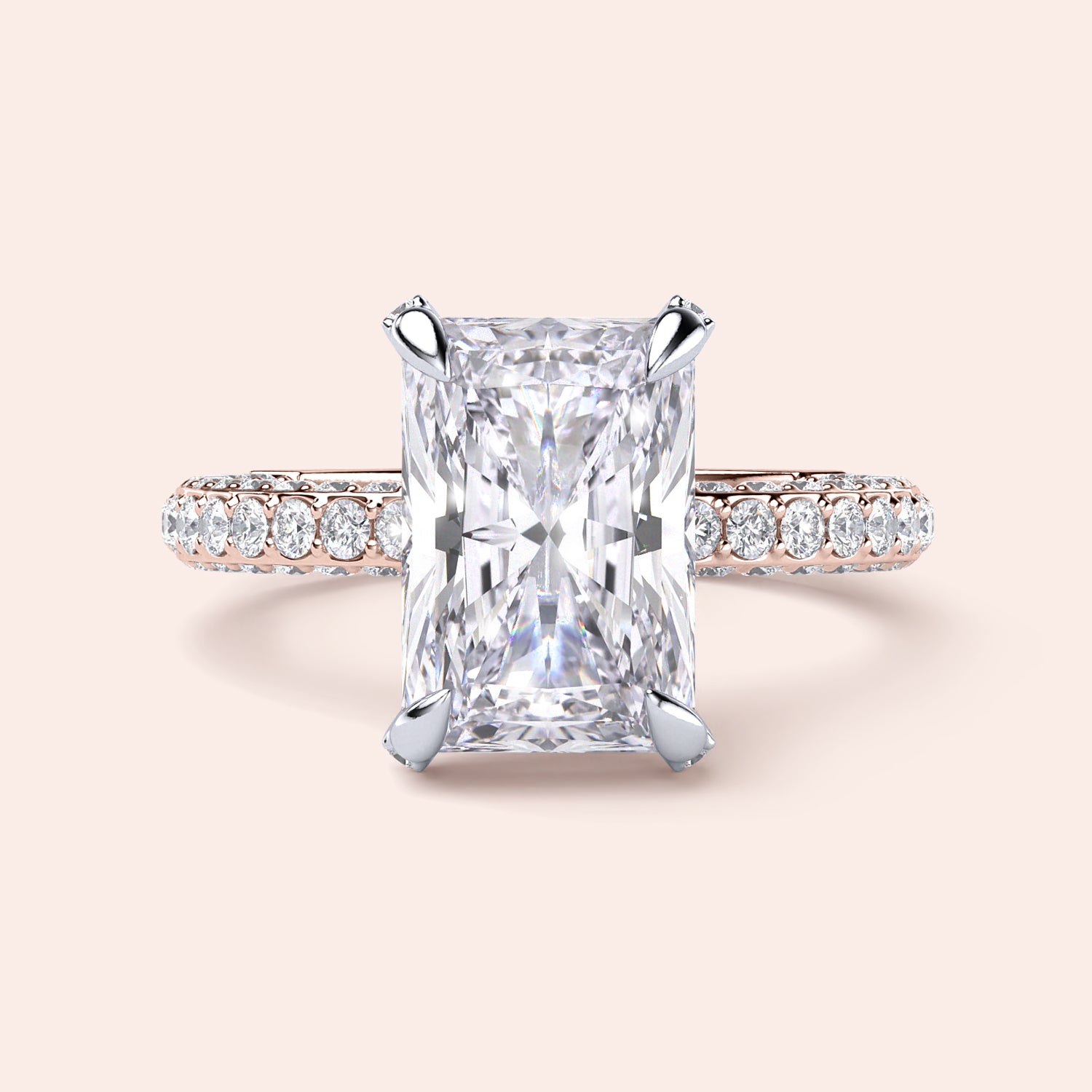 Two-tone white and rose gold engagement ring featuring a radiant cut diamond, crafted in 14K or 18K gold. |
#14KRecycledRose/WhiteGold
#18KRecycledRose/WhiteGold