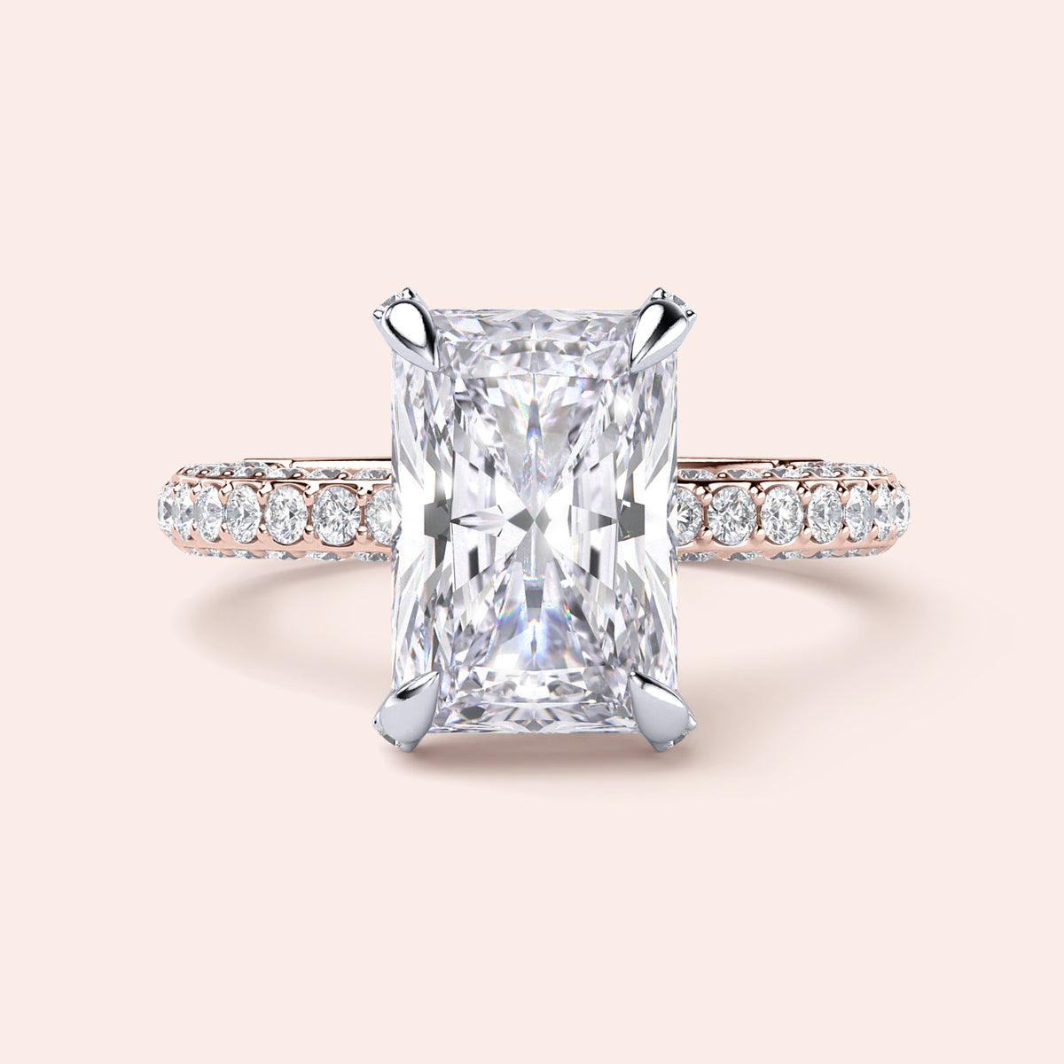 Two-tone white and rose gold engagement ring featuring a radiant cut diamond, crafted in 14K or 18K gold. 