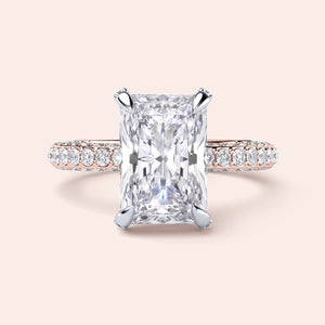Two-tone white and rose gold engagement ring featuring a radiant cut diamond, crafted in 14K or 18K gold. 