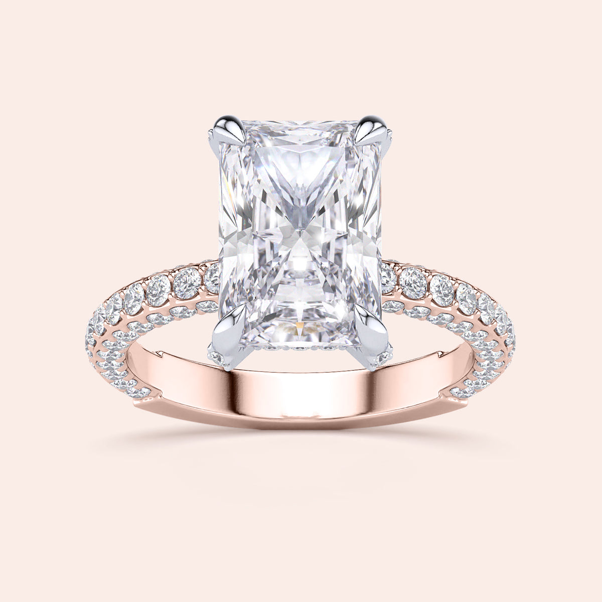 Two-tone white and rose gold diamond ring in radiant shape, featuring exquisite 18K gold design and hidden halo details. 