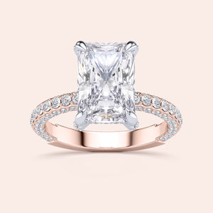 Two-tone white and rose gold diamond ring in radiant shape, featuring exquisite 18K gold design and hidden halo details. 