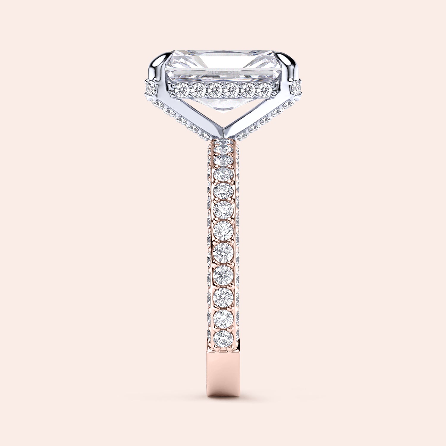 Two-tone 14K/18K white and rose gold diamond ring featuring an emerald-cut stone, showcased on a model's hand. |
#14KRecycledRose/WhiteGold
#18KRecycledRose/WhiteGold
